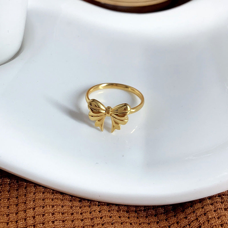 Womens Titanium Steel Ring With Golden Electroplated Finish Bow Butterfly Design Ideal For Couple Jewelry Collection