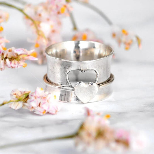 Womens Rotating Heart Ring Fashion Hollow Stitching Peach Heart Metal Ring European American Electroplated Gift