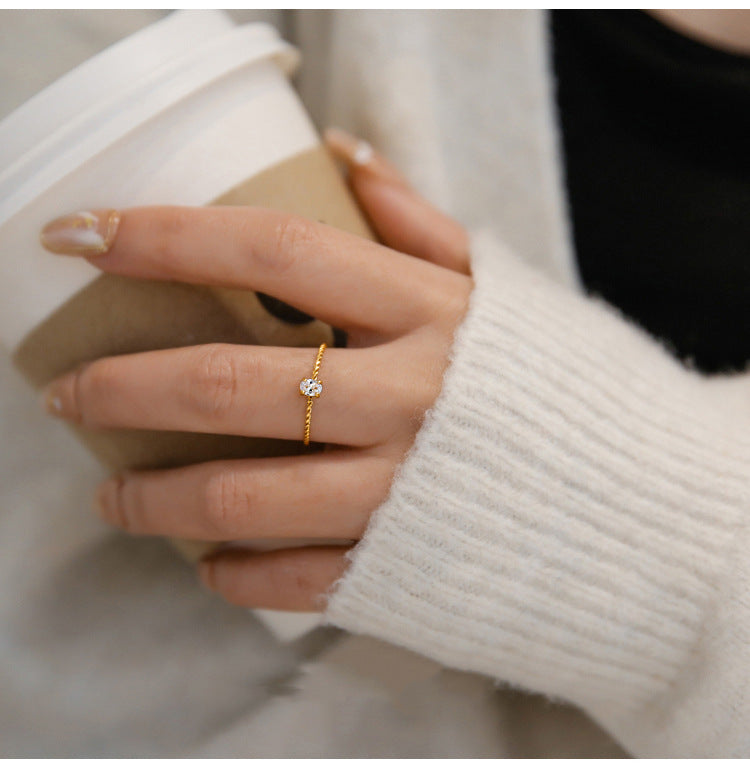 Oval Zircon Twist Ring Gold Plated Titanium Steel Finish