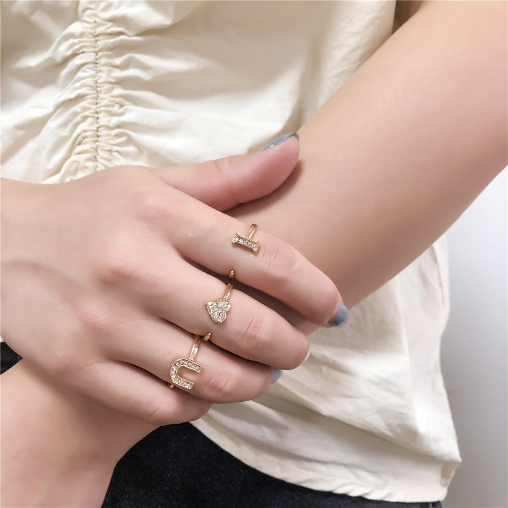 Unisex Gold Plated Letter Ring Geometric Design Alloy With Artificial Gems Electroplated Finish European Style European