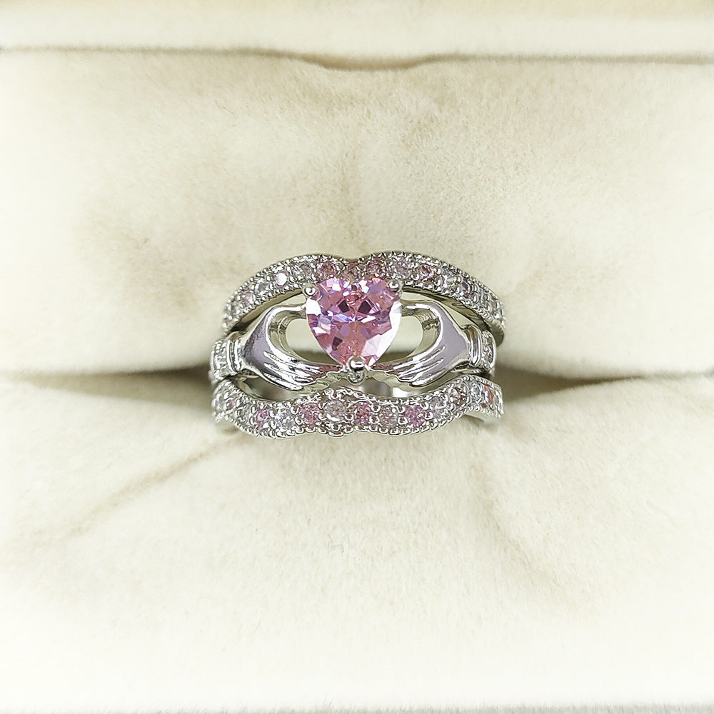 Holding a heart ring