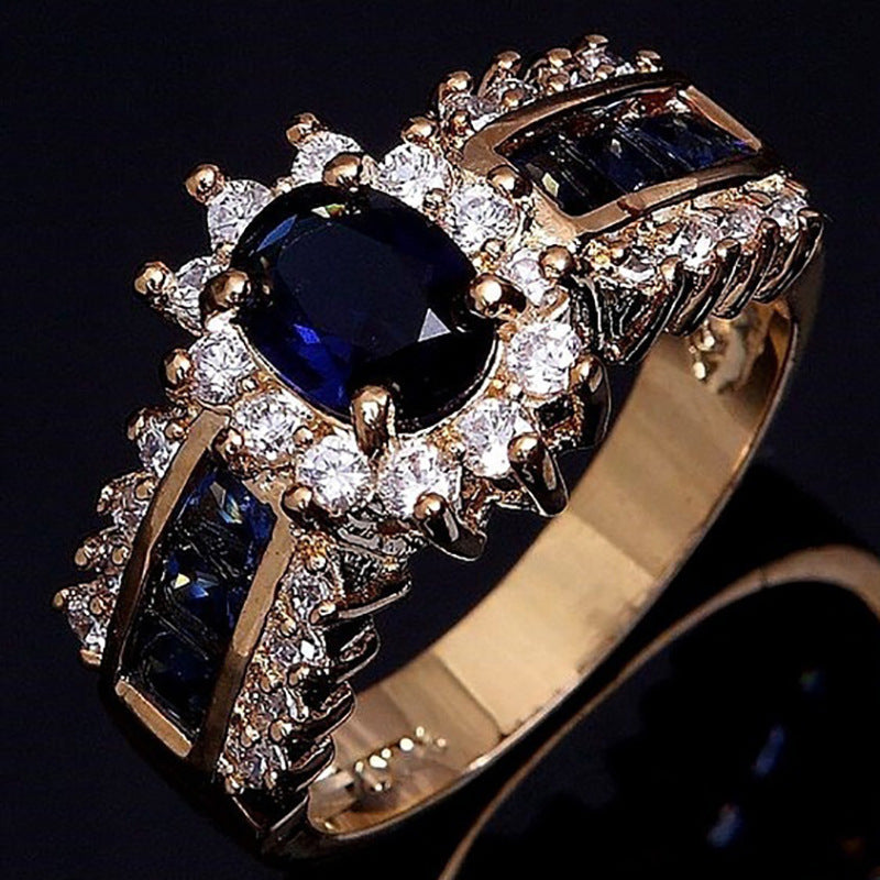 Gold Plated Alloy Ring With Blue Zircon Inlay And Red Zirconia Flower Design Electroplated Finish Metal Accents Details