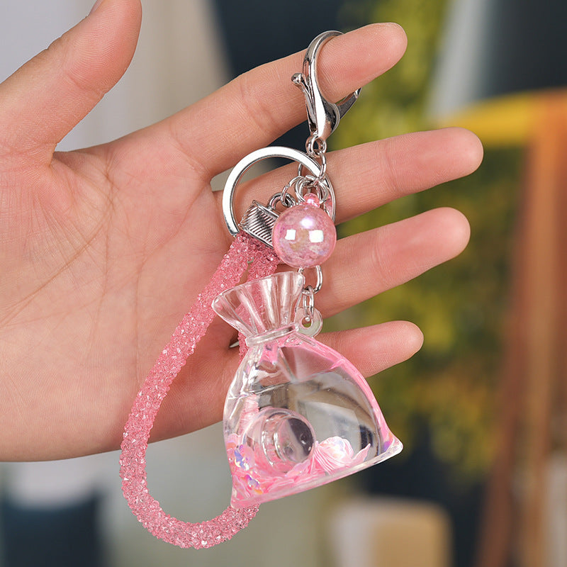 Yellow Acrylic Keychain With Liquid Quicksand Money Bag Design Rope Accent Fashion Accessory Durable Plastic Finish