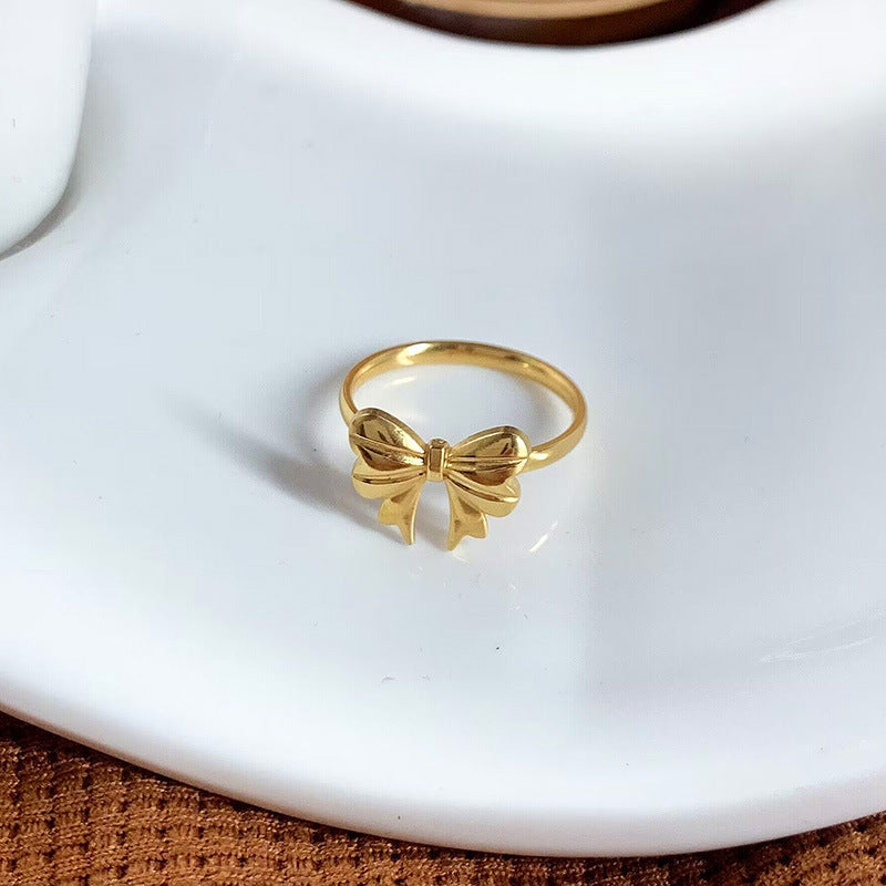 Womens Titanium Steel Ring With Golden Electroplated Finish Bow Butterfly Design Ideal For Couple Jewelry Collection
