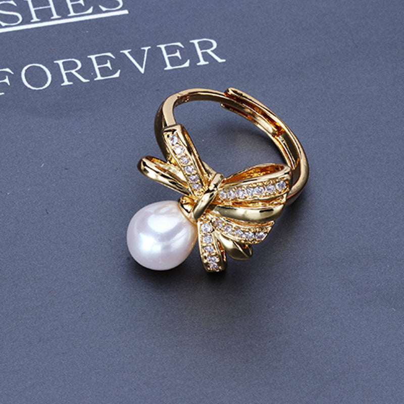 Dailan Jewelry Light Luxury Bowknot Freshwater Pearl Ring Female Opening Adjustable Rice-Shaped Pearl Ring Female Spot