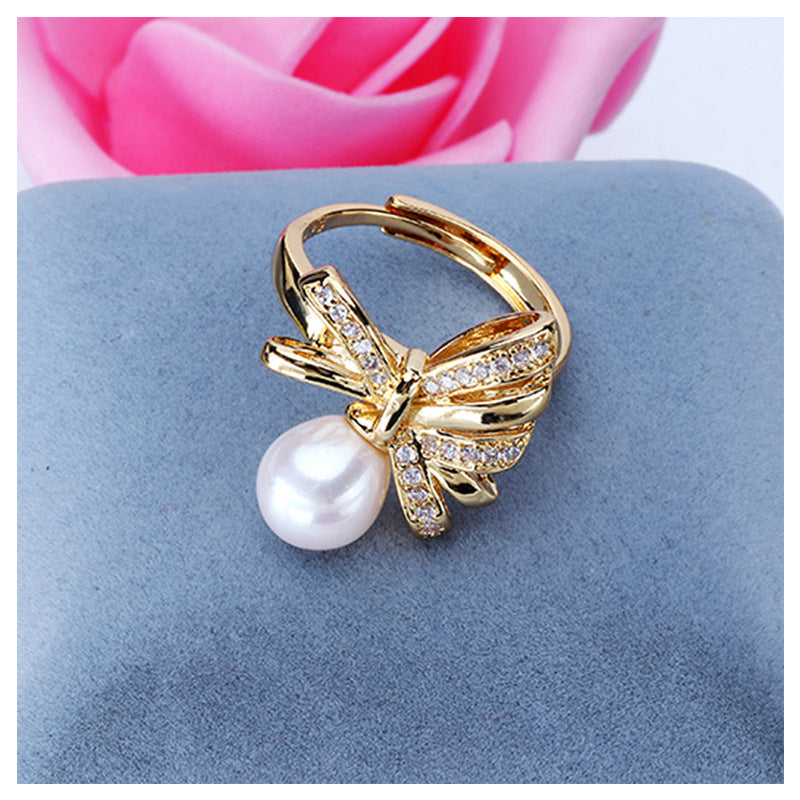 Dailan Jewelry Light Luxury Bowknot Freshwater Pearl Ring Female Opening Adjustable Rice-Shaped Pearl Ring Female Spot