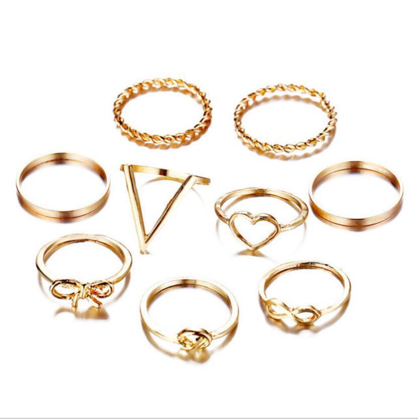 Unisex Alloy Heart Shaped Ring Set Electroplated Finish Retro Hollow Love Knot Bow European Style And American