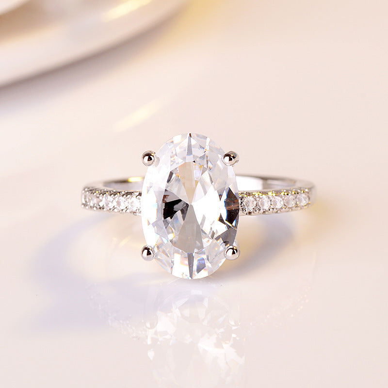 Gold Plated Womens Ring With Oval Simulated Diamond Dove Egg Shape Metal Ring European Design Classy Style Now