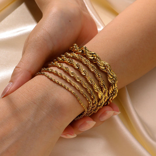 Womens Gold Tone Stainless Steel Twist Bangle Bracelet