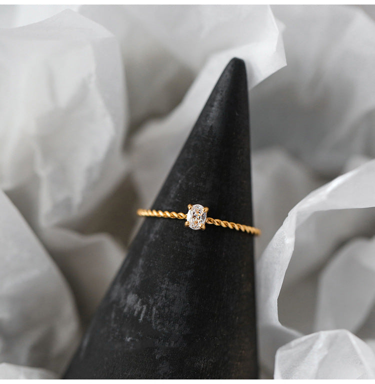 Oval Zircon Twist Ring Gold Plated Titanium Steel Finish