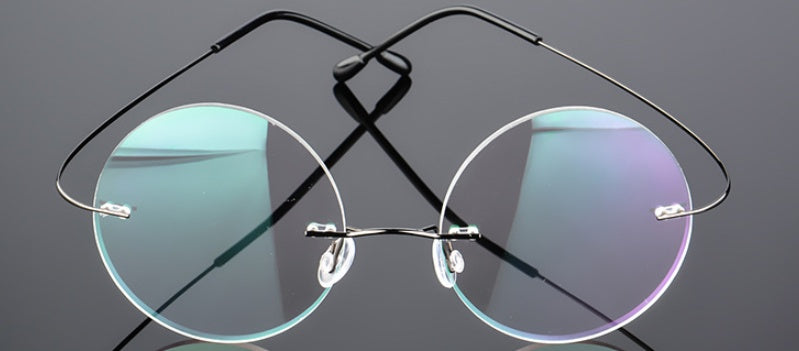 Retro Round Frameless Eyeglasses Men Women Super Elastic Metal Frame Lightweight Titanium Alloy Myopia Glasses