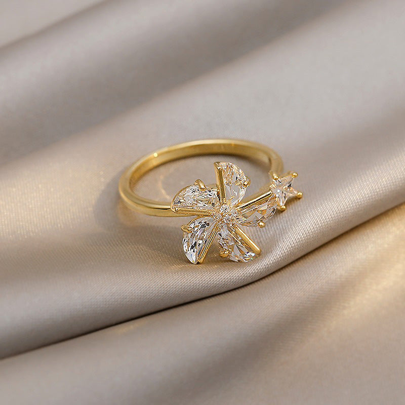 Rotatable Windmill Ring For Women Niche Design Gold Gilded Inlay With Gemstone Detailing And Refined Gold Look