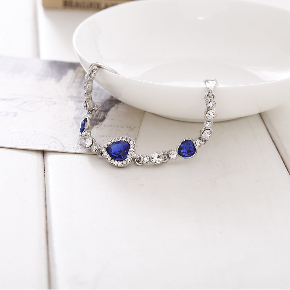 Heart Bracelet With Sparkling Blue Crystals Three Moving Hearts Symbolizing Love And Hope Jewelry Timeless Now