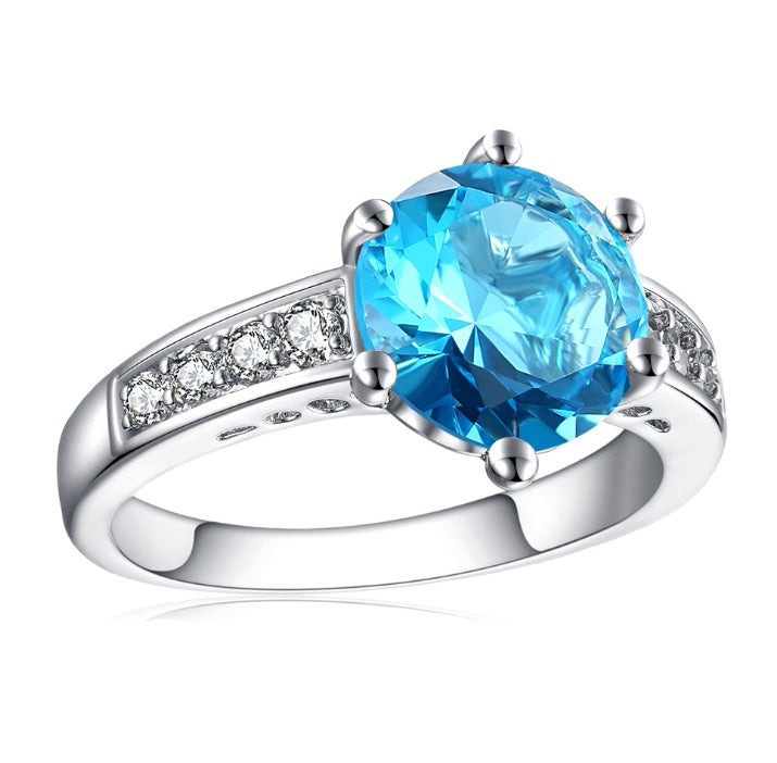 Platinum Plated Six Claw Ring With Micro Inlays White Gems