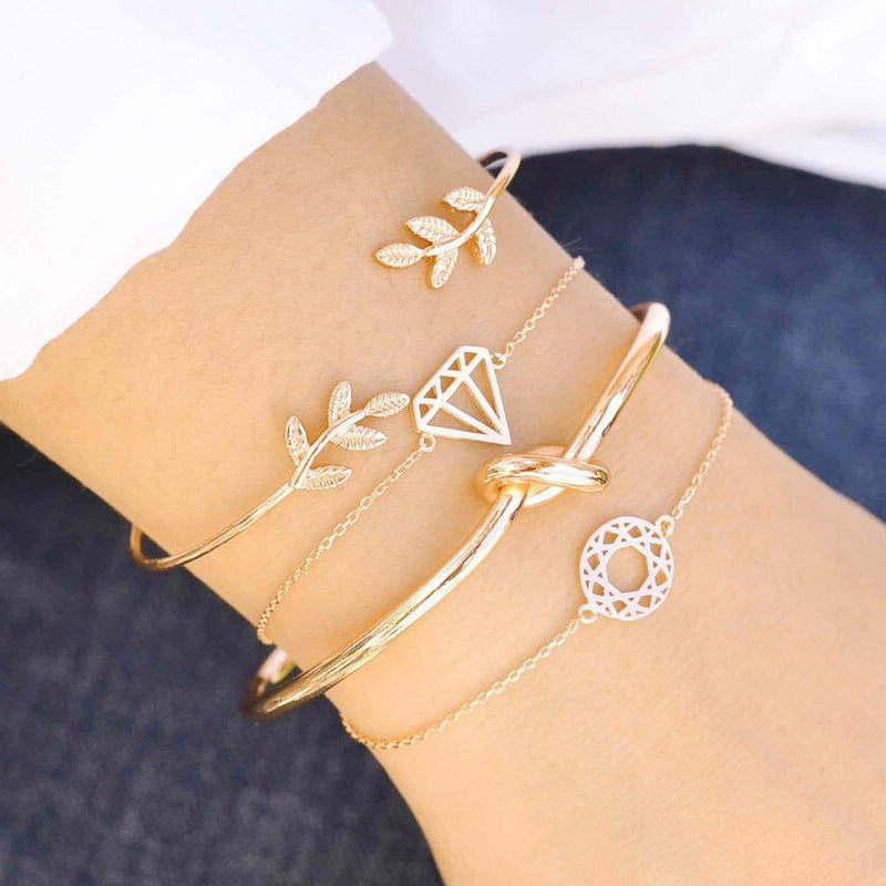 Womens Alloy Leaf Bracelet Set Diamond Knot Carved Hollow European Bangle Jewelry Four Piece Set Fashion Trend