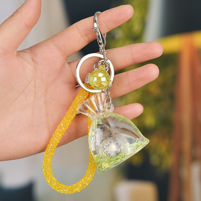 Yellow Acrylic Keychain With Liquid Quicksand Money Bag Design Rope Accent Fashion Accessory Durable Plastic Finish