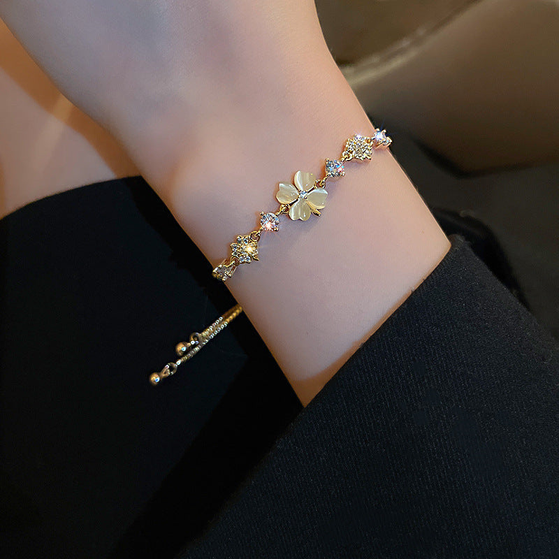 Gold Plated Bracelet With Diamond Encrusted Cats Eye And Petal Flower Design Fashion Alloy Electroplated Bracelet