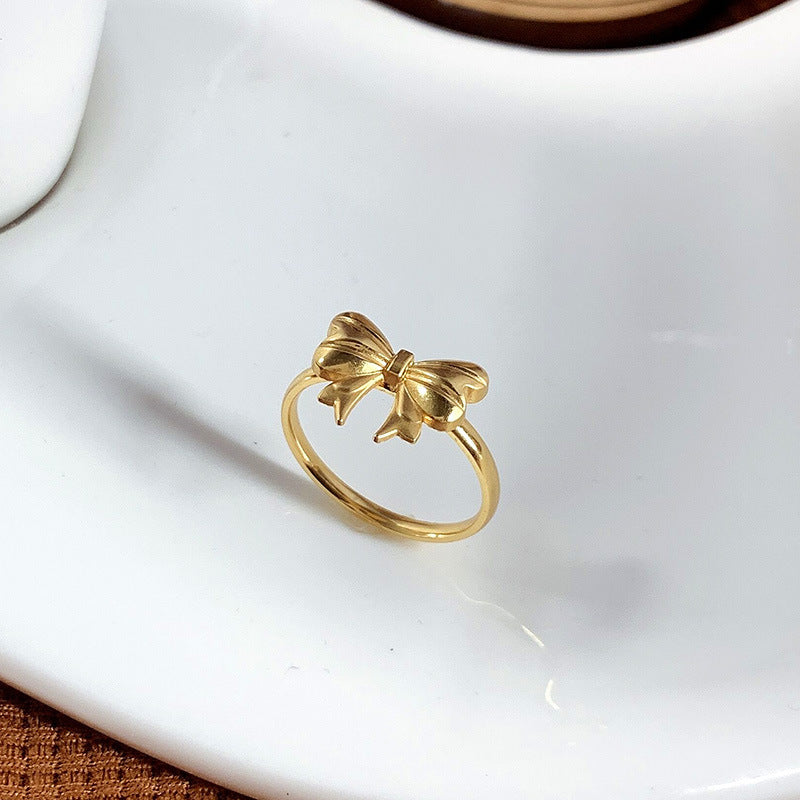 Womens Titanium Steel Ring With Golden Electroplated Finish Bow Butterfly Design Ideal For Couple Jewelry Collection