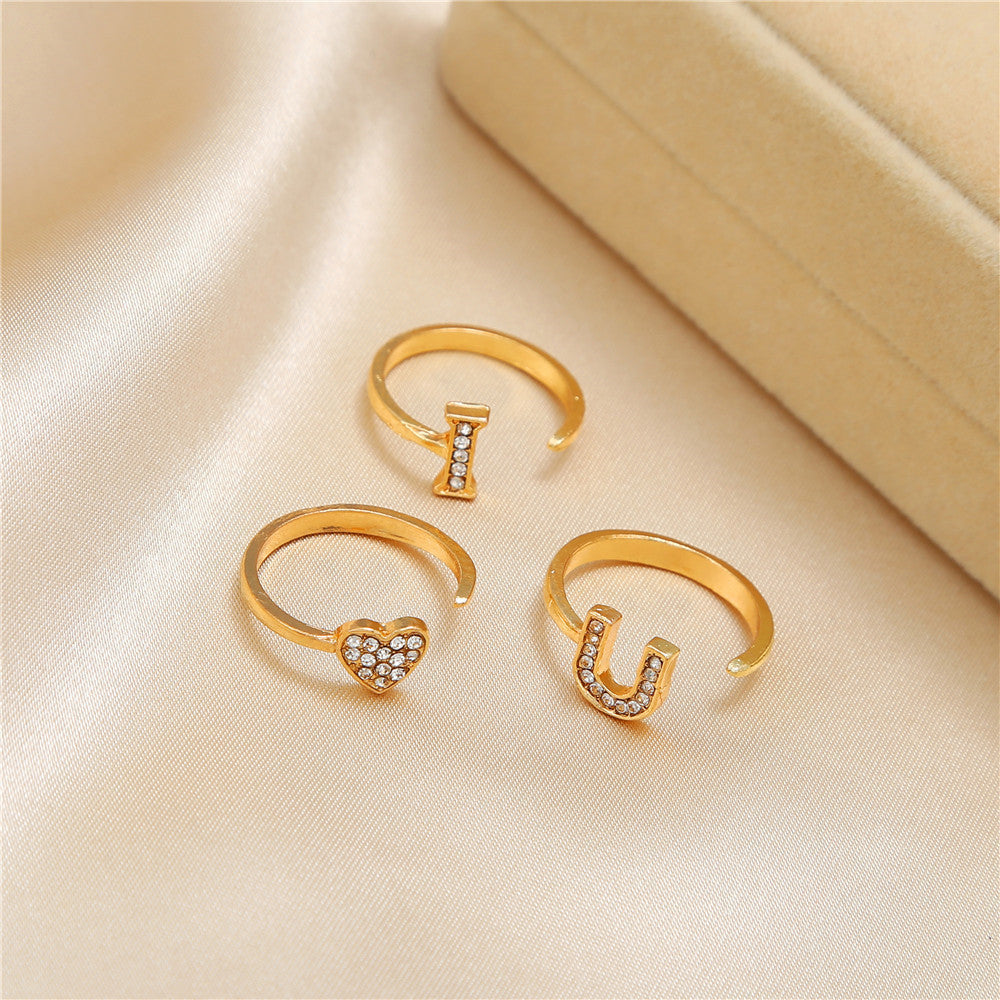 Unisex Gold Plated Letter Ring Geometric Design Alloy With Artificial Gems Electroplated Finish European Style European