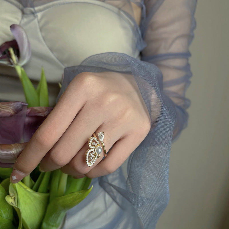 Womens Butterfly Pearl Ring GoldTone Rhinestone Inlaid Copper Alloy Fashion Statement Jewelry Unique Accessory