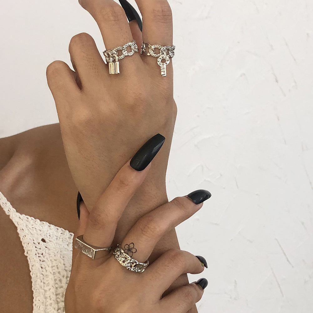 Geometric Alloy Ring With Custom Lettering And Diamond