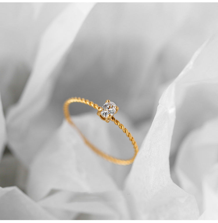 Oval Zircon Twist Ring Gold Plated Titanium Steel Finish