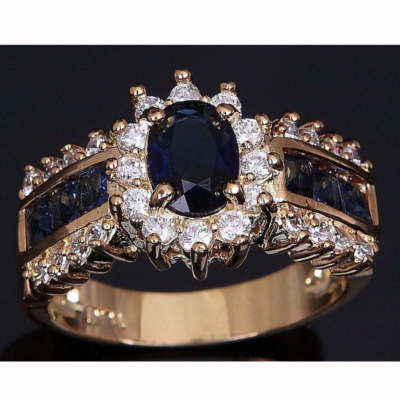 Gold Plated Alloy Ring With Blue Zircon Inlay And Red Zirconia Flower Design Electroplated Finish Metal Accents Details