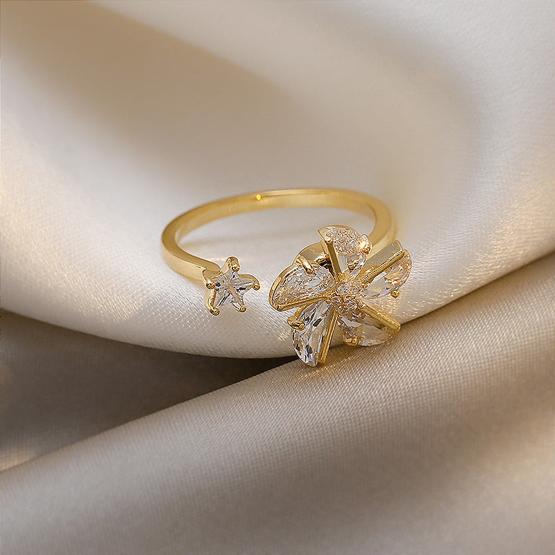 Rotatable Windmill Ring For Women Niche Design Gold Gilded Inlay With Gemstone Detailing And Refined Gold Look