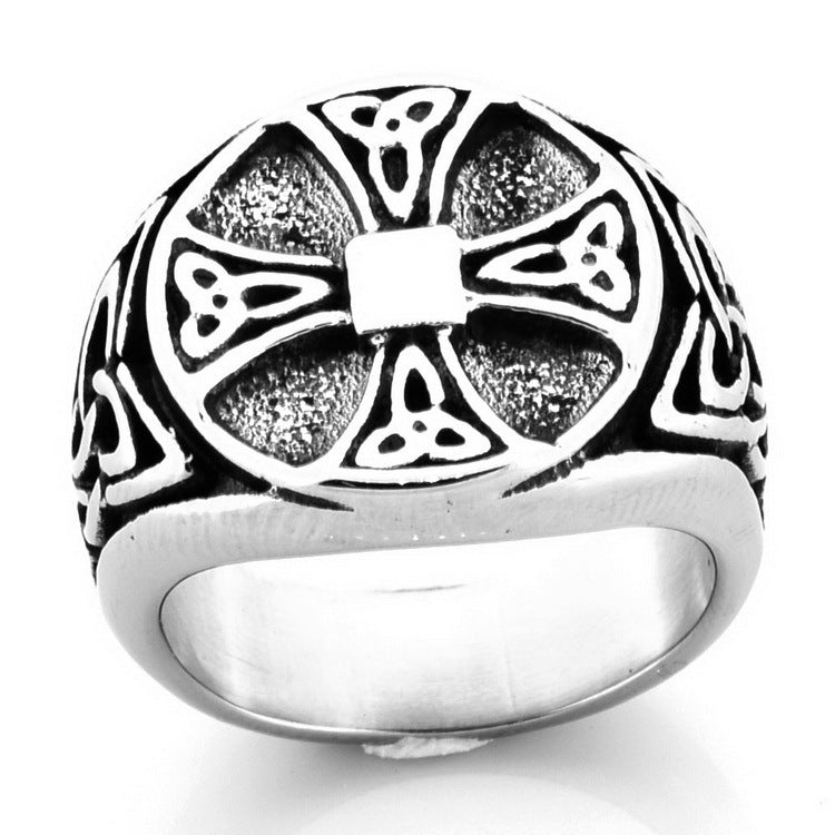 Cross pattern carved ring