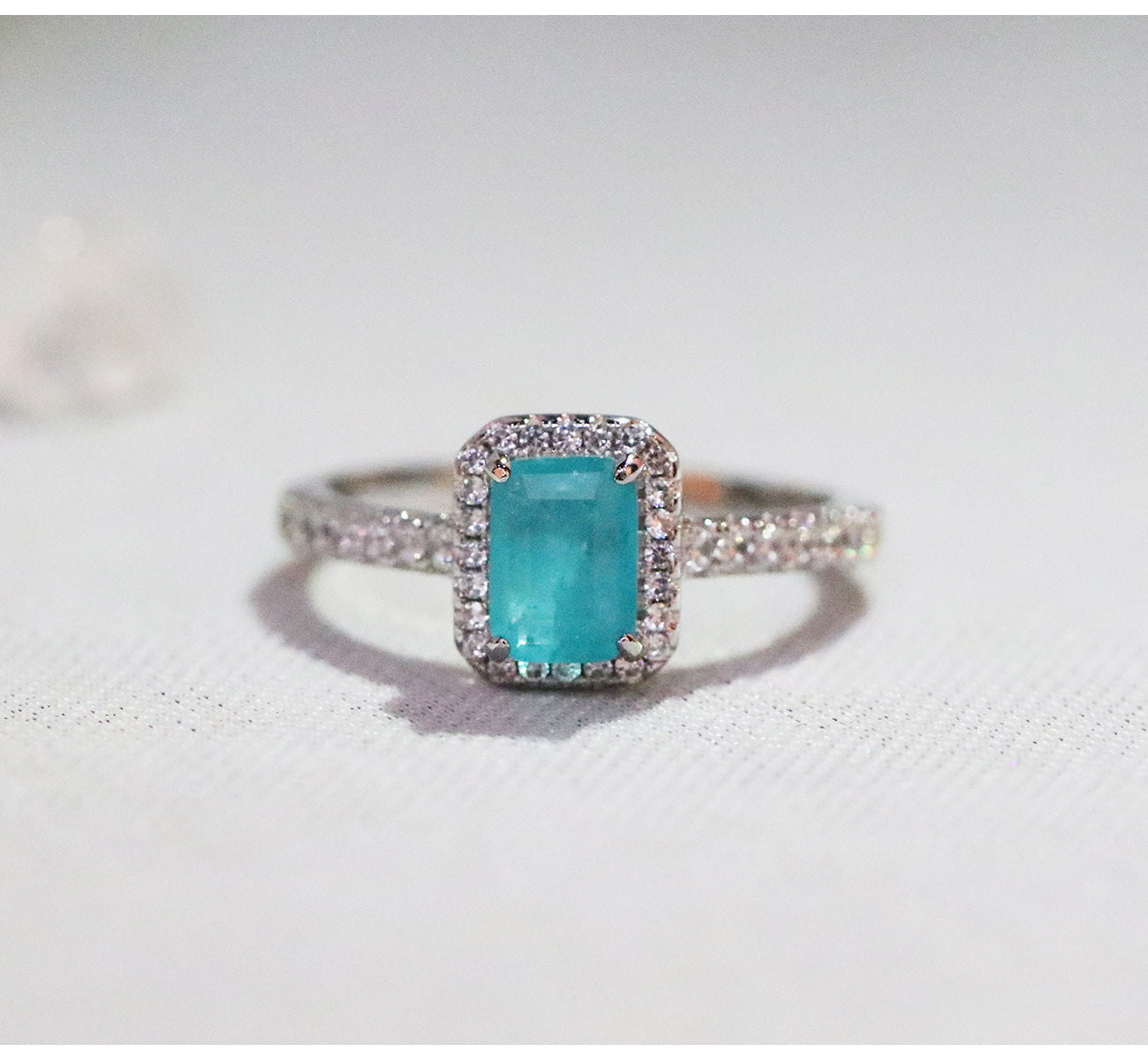 Crown Ring Synthetic Paraiba Crystal And Emerald Accent