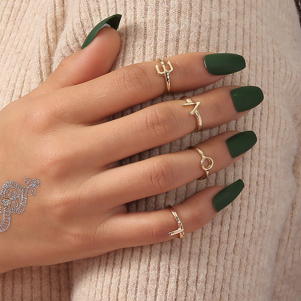 Gold Letter Ring Set Four Pieces For Women Electroplated Alloy Fashion Jewelry Gift Elegant Accessory For Her