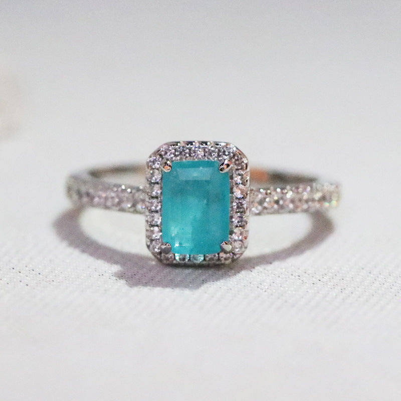 Crown Ring Synthetic Paraiba Crystal And Emerald Accent