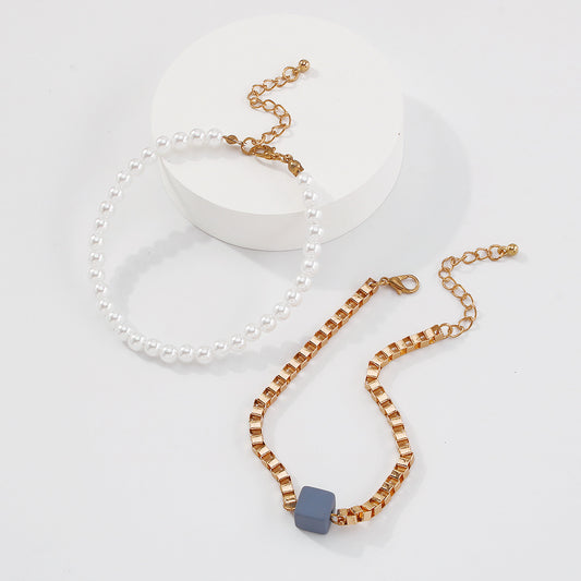 Womens Double Layer Geometric Anklet With Imitation Pearl And Resin Electroplated Gold Finish Size 21 to 27 cm