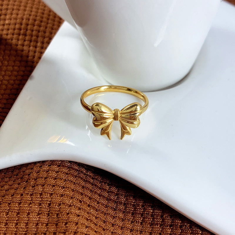 Womens Titanium Steel Ring With Golden Electroplated Finish Bow Butterfly Design Ideal For Couple Jewelry Collection