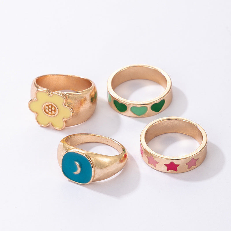 Womens Geometric Alloy Ring Set 4 Piece With Epoxy Love Flower Star Moon Design Modern Simple Jewelry Gift Set