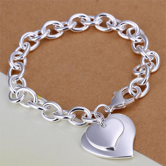 Womens Heart Bracelet Silver Plated Diamond Accent Hollow Heart Design Anniversary Gift Bracelet Elegant Jewelry