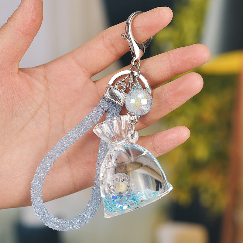 Yellow Acrylic Keychain With Liquid Quicksand Money Bag Design Rope Accent Fashion Accessory Durable Plastic Finish