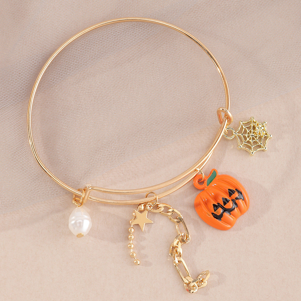 Gold Plated Skull Pendant Bracelet With Ghost Claw Charms