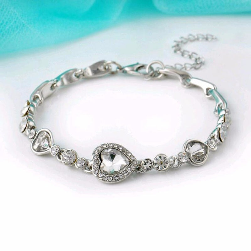 Heart Bracelet With Sparkling Blue Crystals Three Moving Hearts Symbolizing Love And Hope Jewelry Timeless Now